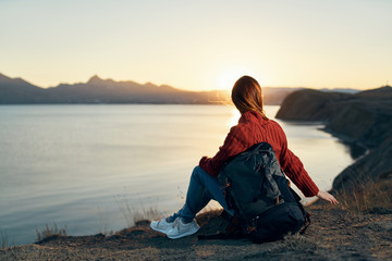 woman sitting on the beach