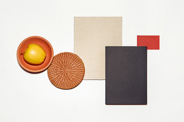 identity set white paper black folder apple in terracotta and wicker