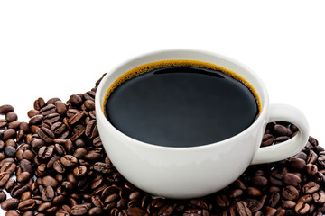 Black coffee in a white coffee cup and coffee beans on a white background
