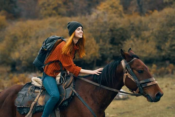 Foto op Canvas woman riding horse © SHOTPRIME STUDIO