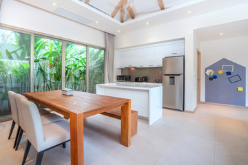 interior design in living room with open kitchen area