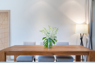 home interior design in living room with dining table