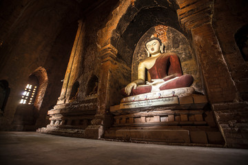 A buddha inside a beautiful temple in Bagan, Myanmar. © unai