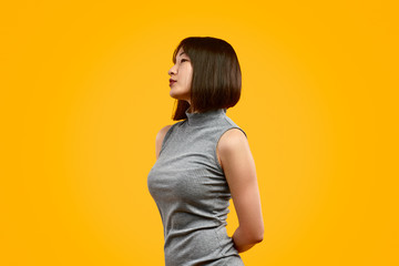 Obraz premium Stylish Asian woman looking away