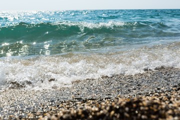 Wave of the Sea on a Beach