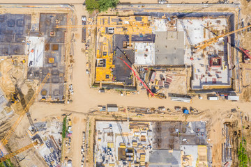 Aerial view of a new house building on a construction site.