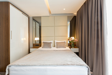 Interior of a luxury hotel double bed bedroom