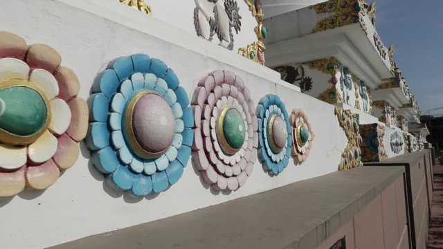 Decor of Buddhism stupa in front of monastery in Indian Tibet colony 