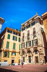 Fototapeta premium Beautiful cozy streets of Genoa in summer day, Liguria, Italy