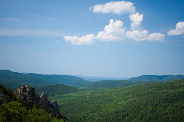 view of the Ural mountains in sunny weather from the mountain