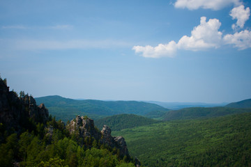 view of the Ural mountains in sunny weather from the mountain
