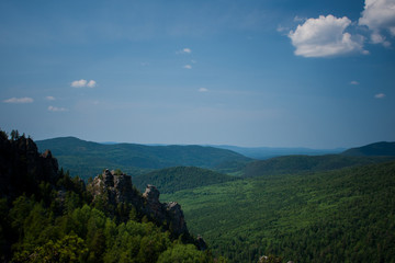view of the Ural mountains in sunny weather from the mountain