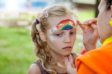 colorful summer rainbow face painting