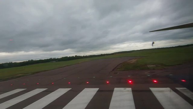 Slow Motion Of Plane At The Start Of The Runway.