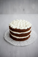 cake with chocolate and white cream