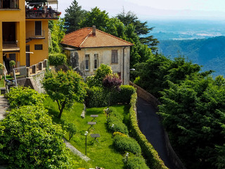 View of Lake Como in cloudy day with the buildings of Bellagio, a charming tourist village