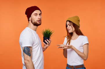 Young Couple In White Studio T-Shirts