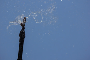 Close up of water sprinkler working