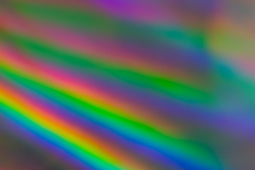 colorful holographic paper with rainbow lights.