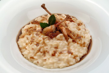 Italian food recipes, rice with quails.