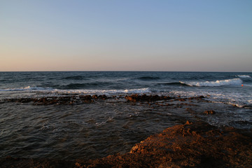 Fototapeta na wymiar Wellengang an einem Strand
