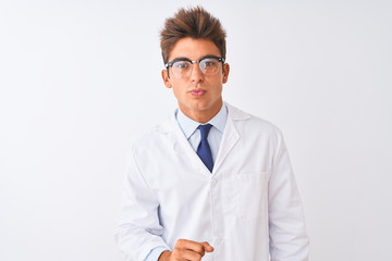 Young handsome sciencist man wearing glasses and coat over isolated white background looking at the camera blowing a kiss on air being lovely and sexy. Love expression.