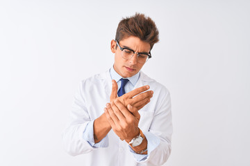 Young handsome sciencist man wearing glasses and coat over isolated white background Suffering pain...