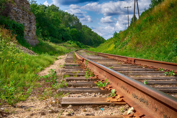 Low angle view of a railway line curving away