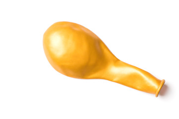 golden inflatable ball on a white background