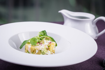 Russian national cold soup okroshka with sour milk drink