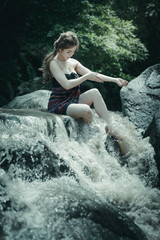 Fototapeta na wymiar model in the waterfall