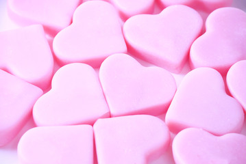 Obraz premium Closeup group of pink hearts background.