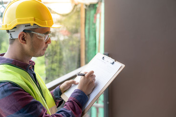 Construction concept , Foreman officer inspector defect about engineer&architect work home building before complete project