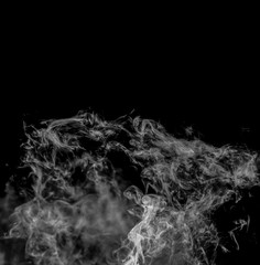 jet of gray smoke on a black background