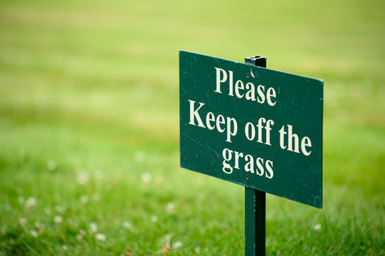 Please Keep Off The Grass Sign