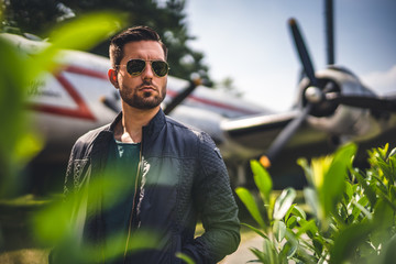Man in front of old Plane