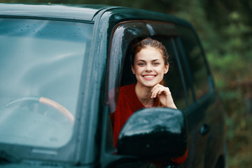 Fototapeta na wymiar young woman in the car