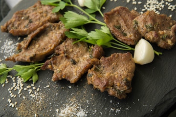 Korean grilled meat, bulgogi, barbecue meat closeup