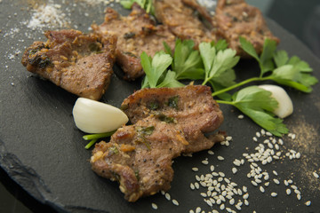Korean grilled meat, bulgogi, barbecue meat closeup