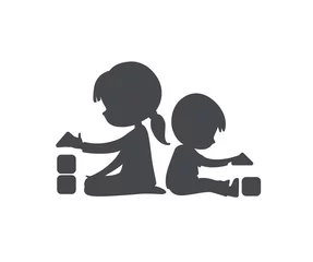 Door stickers Daycare Simple Silhouette of Boy and Girl playing with toy blocks. Can be used as logo or sign. Vector Black and white illustration. isolated.