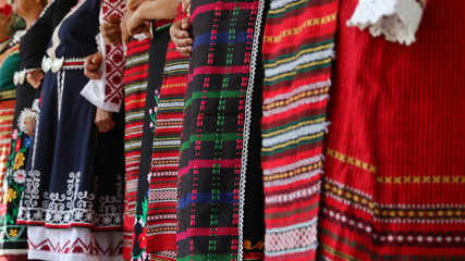 Vratsa, Bulgaria - June 23, 2019: People in traditional authentic folk costumes on National...