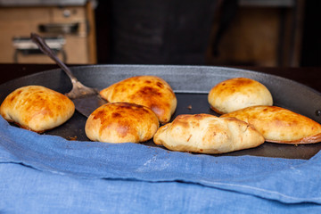 street food: fresh hot cakes (pastries) close