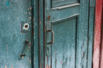 old wooden door with lock  craquelure cracked paint