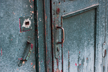 old wooden door with lock craquelure cracked paint