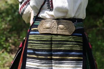 Vratsa, Bulgaria - June 23, 2019: People in traditional authentic folk costumes on National...