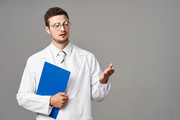 young doctor with clipboard