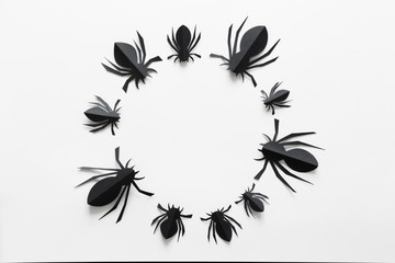 Spiders frame on white background. Halloween holiday concept. Top view, flat lay