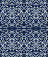 Woodblock printed indigo dye seamless floral ethnic pattern. Traditional oriental ornament of India, flower garland motif, ecru on navy blue background. Textile design.