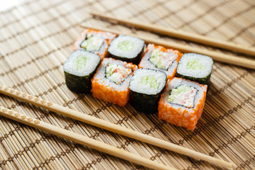 sushi with chopsticks
