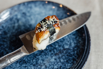 ashtray with cigarette and ashtray